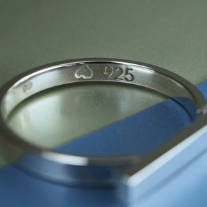Ellipsis silver ring